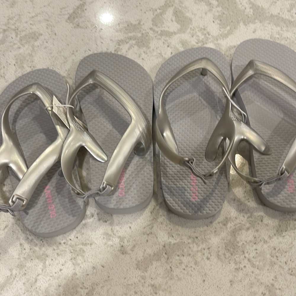 Old navy new silver kids flip flops size 6 & 10